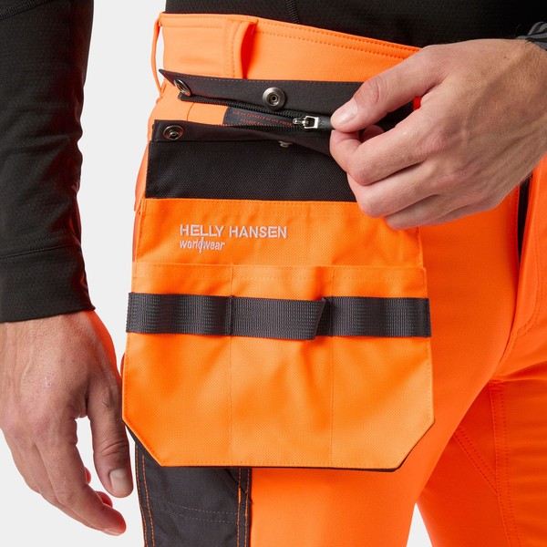 Poche essentielle haute visibilité HH Connect™ 1 Helly Hansen Vue portée de face Orange fluo