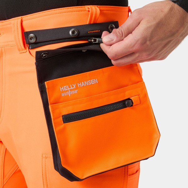 Poche essentielle haute visibilité HH Connect™ 2 Helly Hansen Vue portée de face Orange fluo