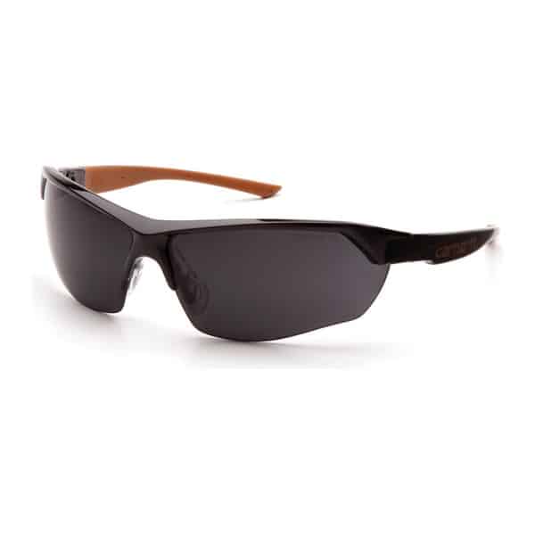 Lunettes de protection à verres gris et branches à cliquet Carhartt gris vue de trois-quarts
